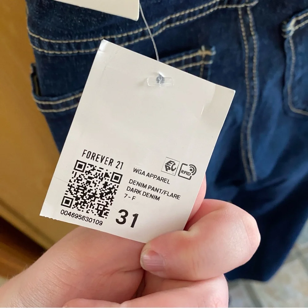 Forever 21 • Low-Rise Dark Wash Raw Hem Flare Jeans - Picture 11 of 16